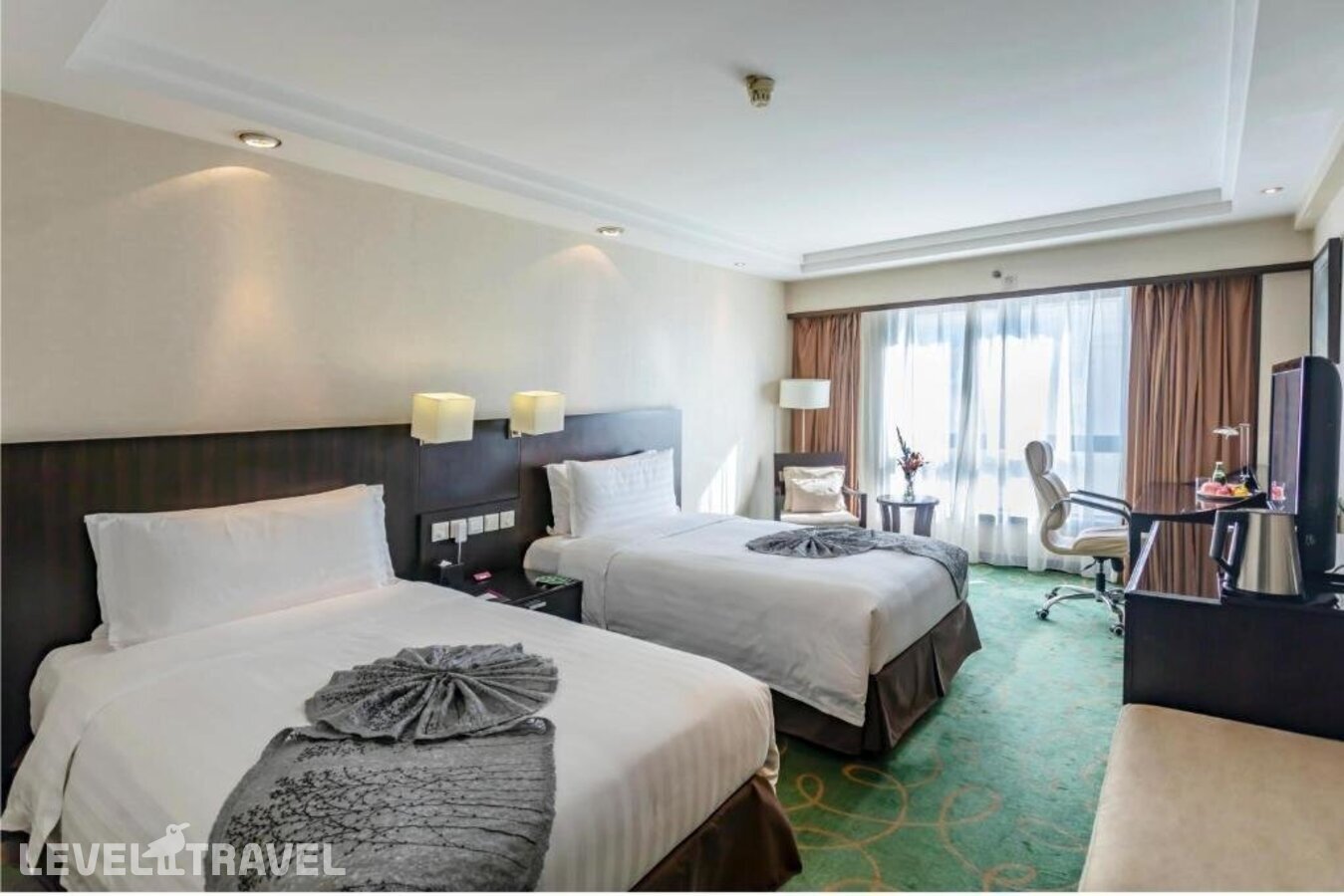 фотографии номера Делюкс (две односпальные кровати) отеля Guo Ji Yi Yuan Hotel в Китай(Пекин) - фото №2