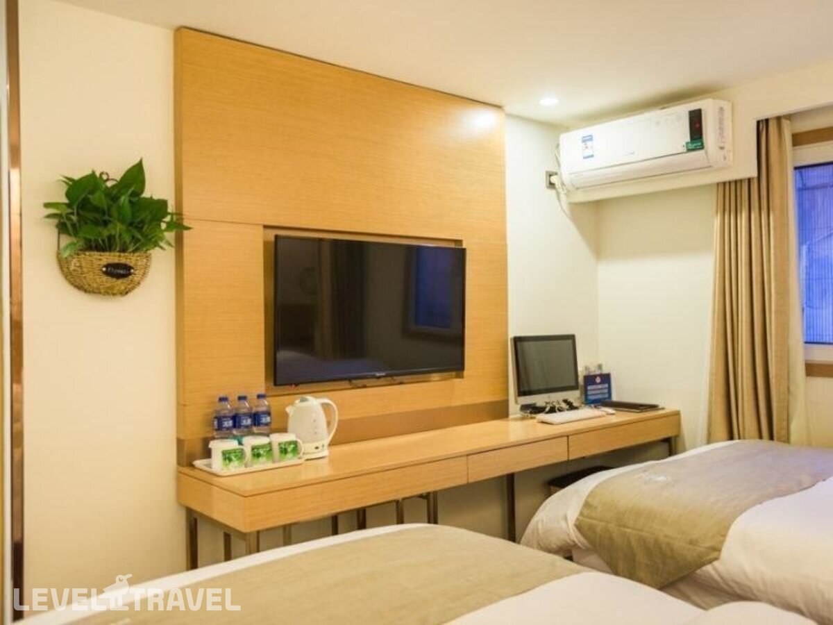 фотографии номера Стандартный (две односпальные кровати) отеля Greentree Inn Beijing Houhai Express Hotel в Китай(Пекин) - фото №2