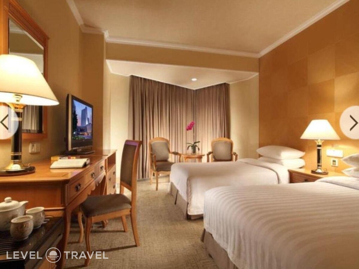 фотографии номера Улучшенный (две односпальные кровати) отеля Hotel Nikko New Century Beijing в Китай(Пекин) - фото №1