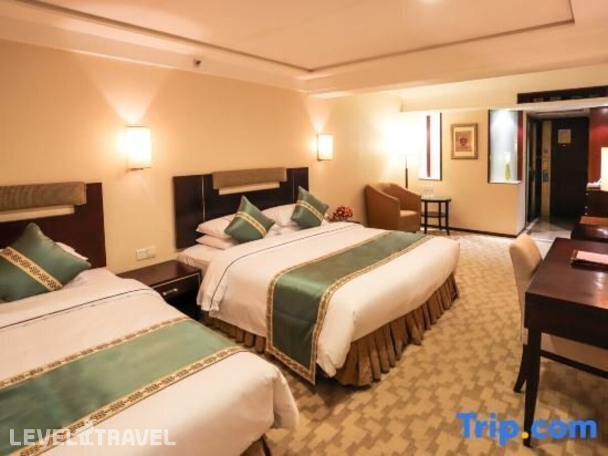фотографии номера Семейный номер отеля Guangdong Victory Hotel в Китай(Гуанчжоу) - фото №3