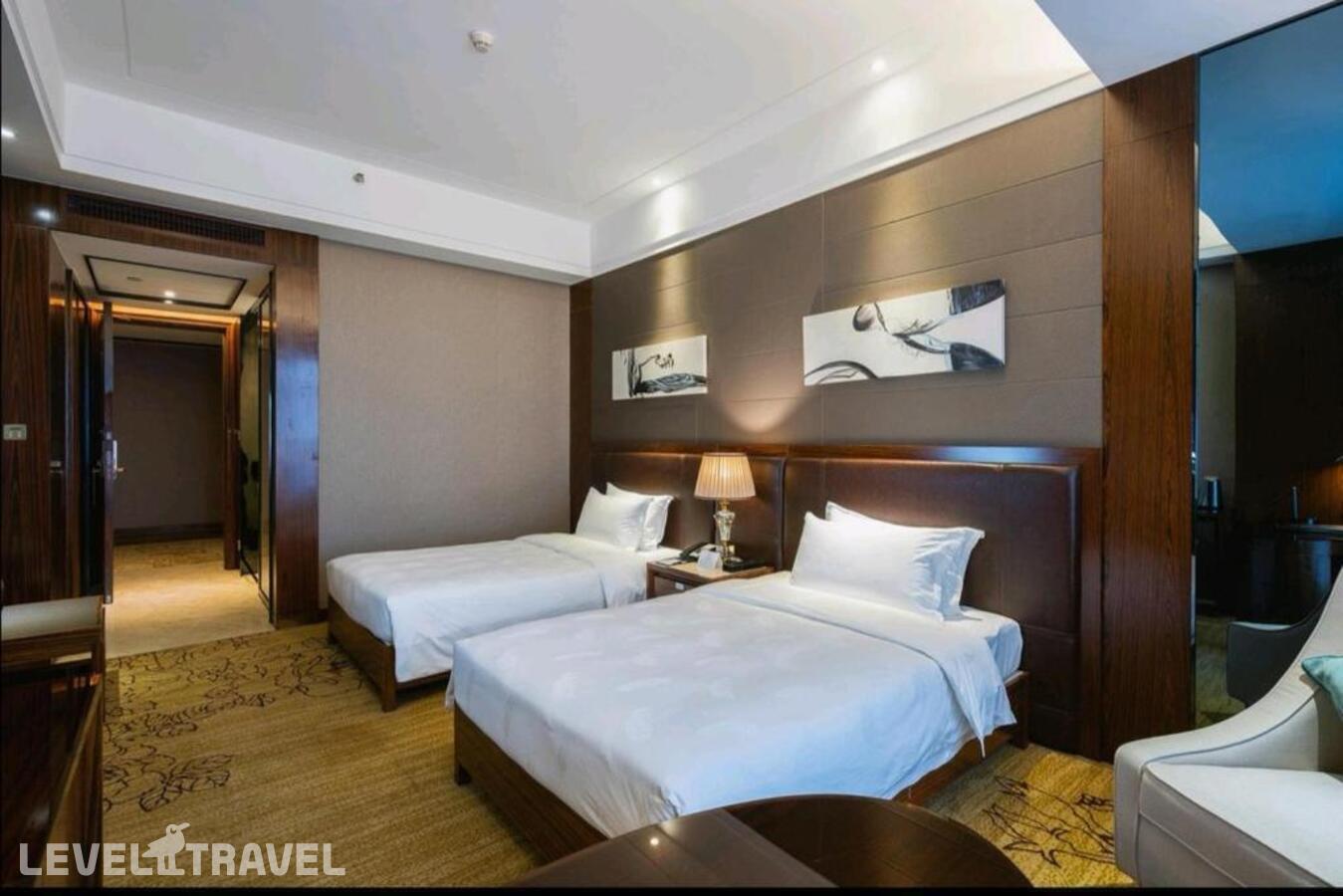 фотографии номера Улучшенный (две односпальные кровати) отеля Honder International Hotel в Китай(Гуанчжоу) - фото №3