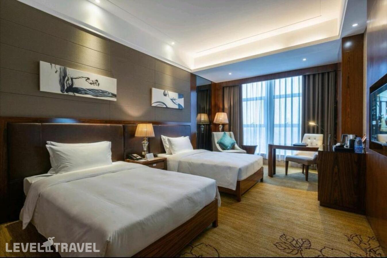 фотографии номера Улучшенный (две односпальные кровати) отеля Honder International Hotel в Китай(Гуанчжоу) - фото №1