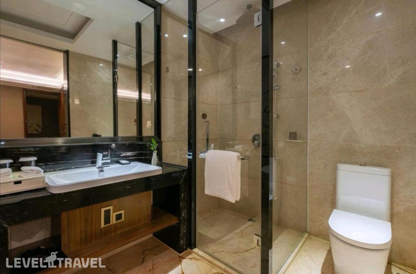 фотографии номера Делюкс (две односпальные кровати) отеля Honder International Hotel в Китай(Гуанчжоу) - фото №9