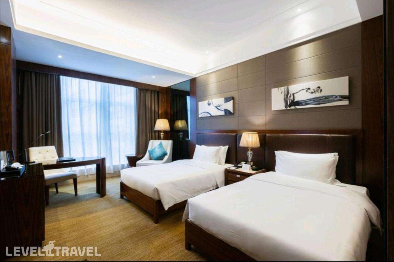 фотографии номера Делюкс (две односпальные кровати) отеля Honder International Hotel в Китай(Гуанчжоу) - фото №8