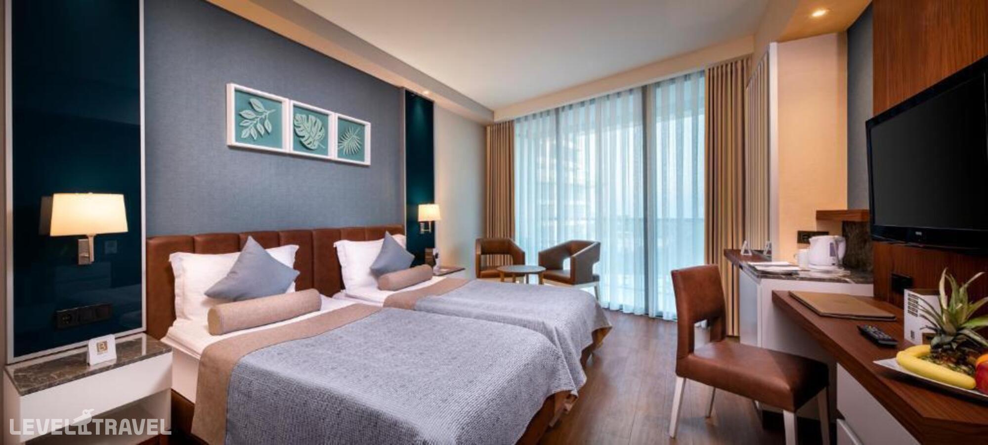фотографии номера Экономичный (две односпальные кровати) отеля Baia Lara Hotel в Турция(Лара) - фото №1