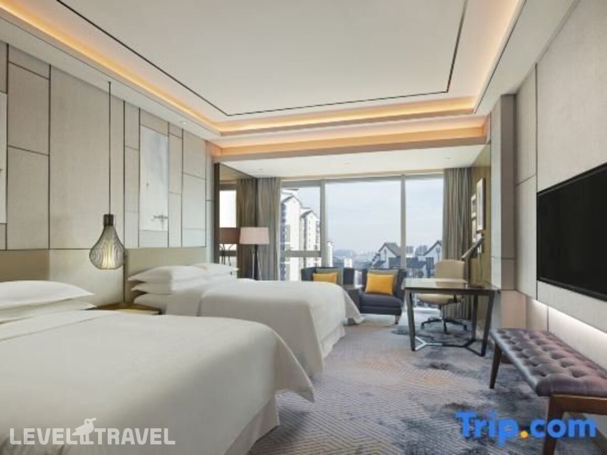 фотографии номера Представительский (две односпальные кровати) отеля Sheraton Guangzhou Nansha Hotel в Китай(Гуанчжоу) - фото №7