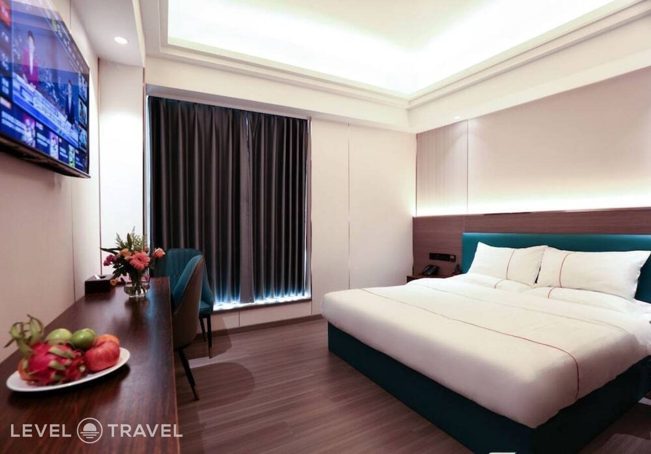фотографии номера Комфорт (две односпальные кровати) отеля Guangzhou Meigang Hotel в Китай(Гуанчжоу) - фото №1