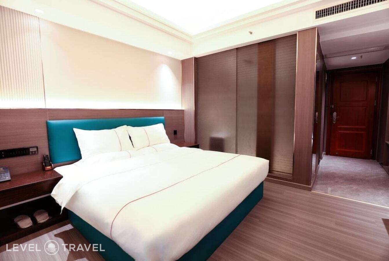 фотографии номера Комфорт (две односпальные кровати) отеля Guangzhou Meigang Hotel в Китай(Гуанчжоу) - фото №3