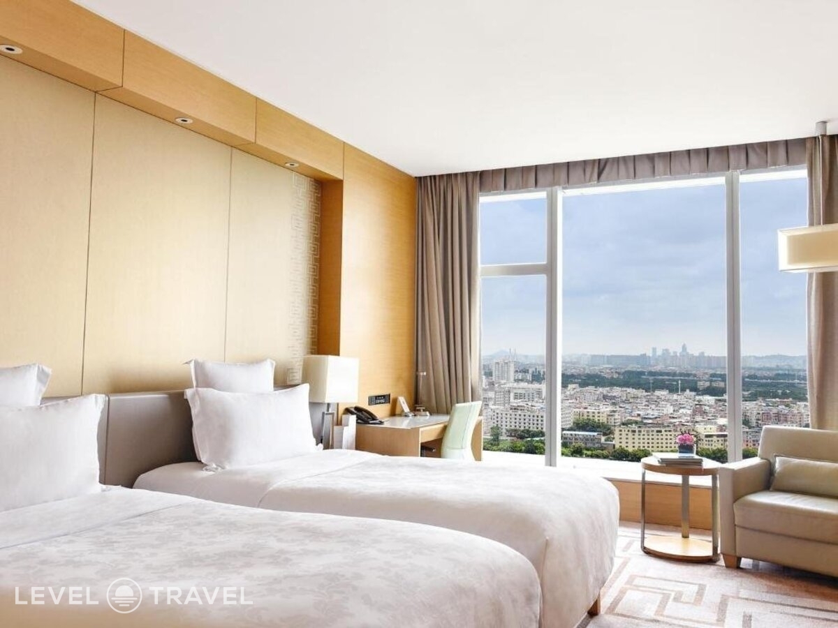 фотографии номера Делюкс с видом на город (две односпальные кровати) отеля Langham Place, Guangzhou в Китай(Гуанчжоу) - фото №1