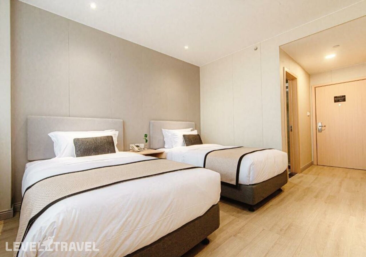 фотографии номера Стандартный (две односпальные кровати) отеля Shanghai Joyful Yard Hotel в Китай(Шанхай) - фото №1
