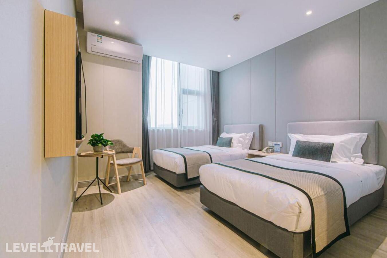фотографии номера Стандартный (две односпальные кровати) отеля Shanghai Joyful Yard Hotel в Китай(Шанхай) - фото №3