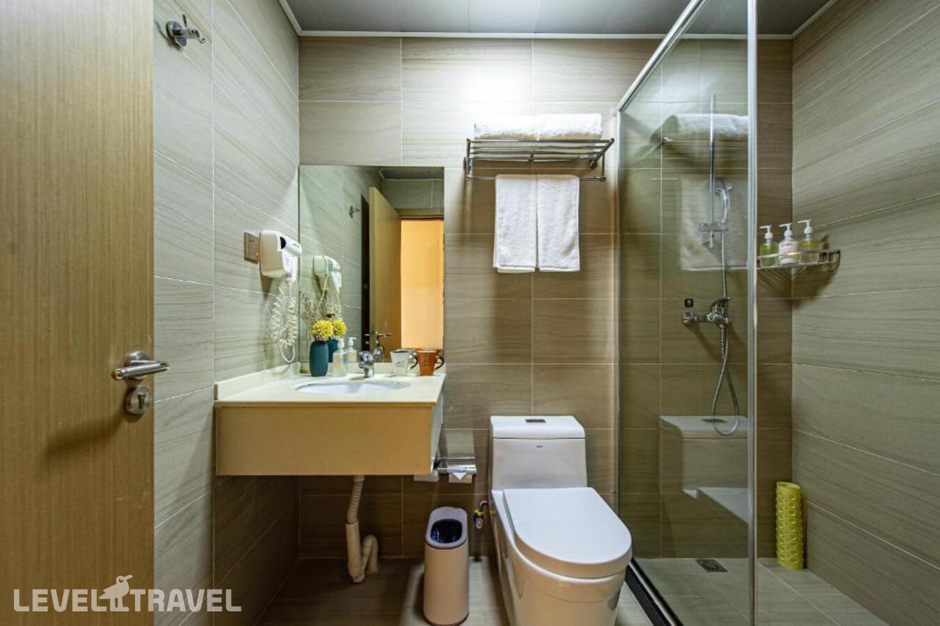 фотографии номера Стандартный (две односпальные кровати) отеля Shanghai Joyful Yard Hotel в Китай(Шанхай) - фото №6