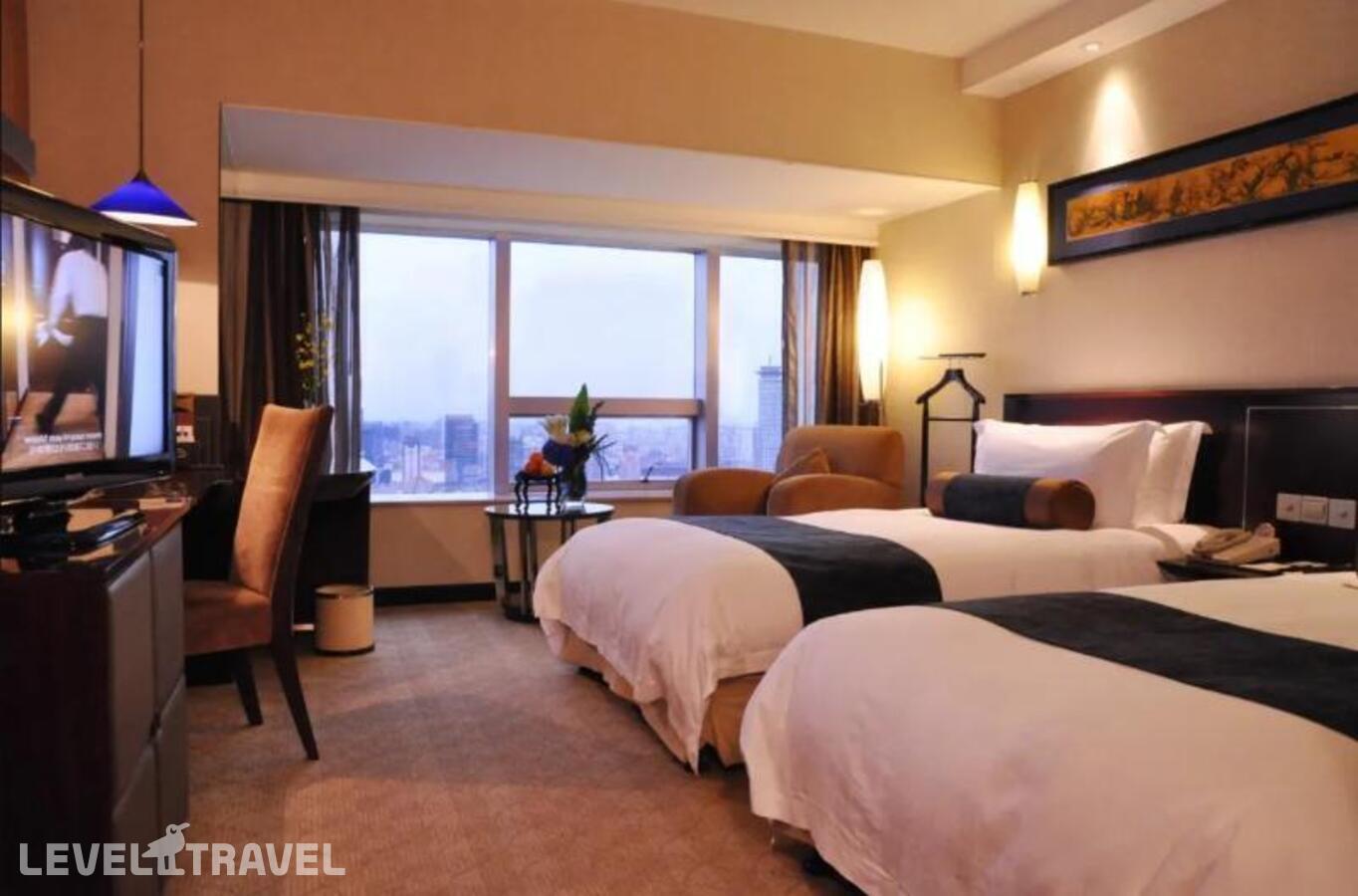 фотографии номера Представительский (две односпальные кровати) отеля Jinling Purple Mountain Hotel Shanghai в Китай(Шанхай) - фото №1