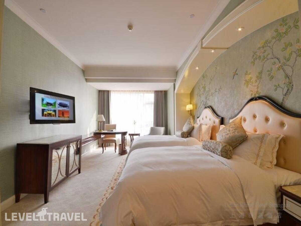 фотографии номера Улучшенный (две односпальные кровати) отеля Guyi Jade Eco-Wellness Hotel (Ex. Urban Island Hotel Shanghai) в Китай(Шанхай) - фото №1
