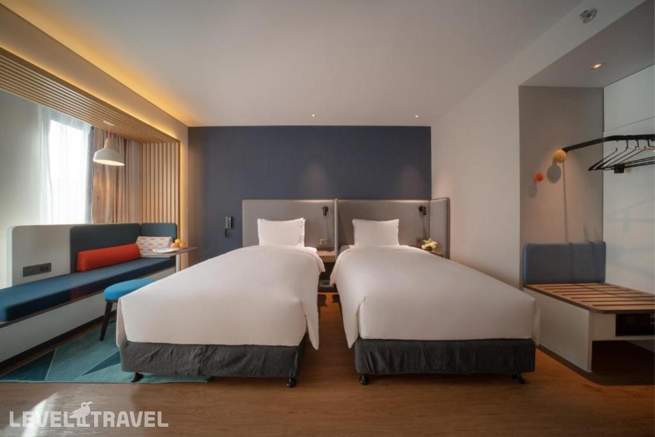 фотографии номера Улучшенный (две односпальные кровати) отеля Holiday Inn Express Shanghai Huijin, An Ihg Hotel в Китай(Шанхай) - фото №3