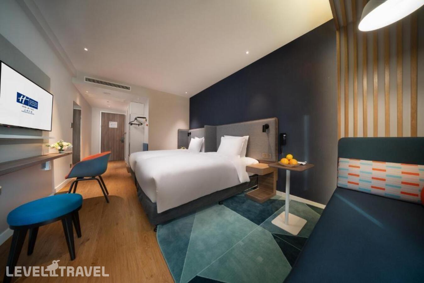 фотографии номера Улучшенный (две односпальные кровати) отеля Holiday Inn Express Shanghai Huijin, An Ihg Hotel в Китай(Шанхай) - фото №2