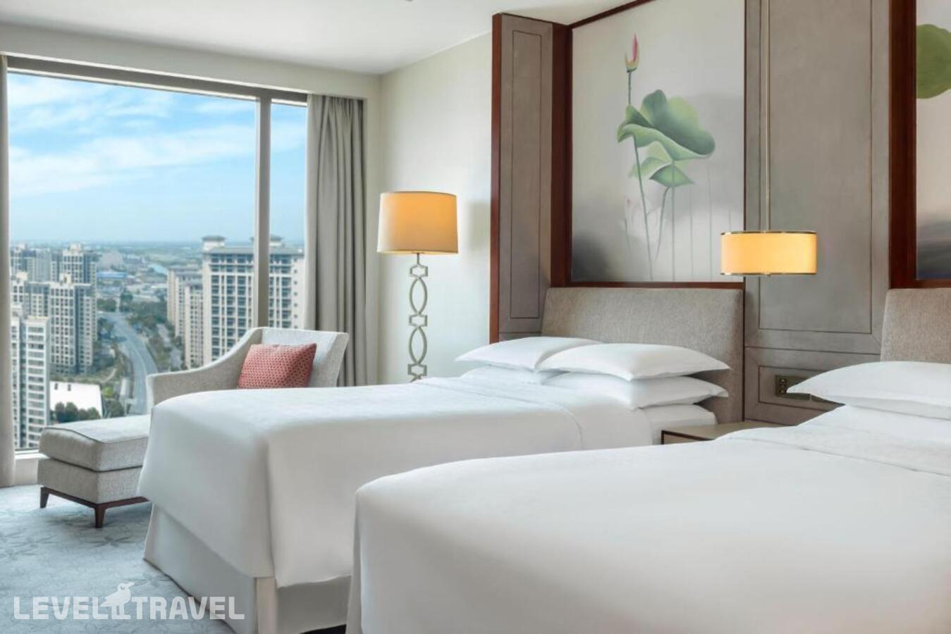 фотографии номера Делюкс (две односпальные кровати) отеля Sheraton Shanghai Jiading Hotel в Китай(Шанхай) - фото №3