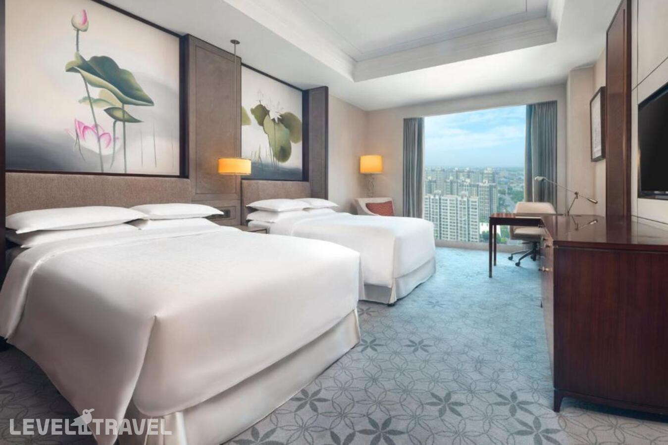 фотографии номера Делюкс (две односпальные кровати) отеля Sheraton Shanghai Jiading Hotel в Китай(Шанхай) - фото №2