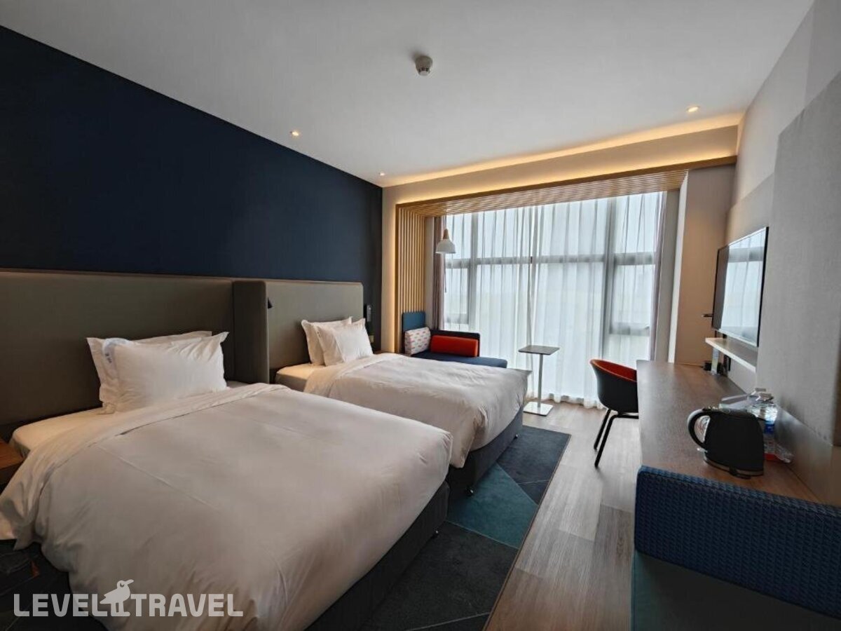 фотографии номера Улучшенный (две односпальные кровати) отеля Holiday Inn Express Shanghai Qingpu New City, An Ihg Hotel в Китай(Шанхай) - фото №1