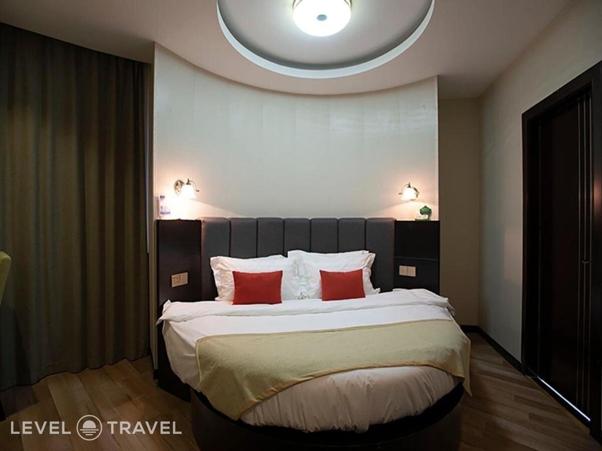 фотографии номера Семейный (две односпальные кровати) отеля Shanghai Joyful Star Hotel в Китай(Шанхай) - фото №5