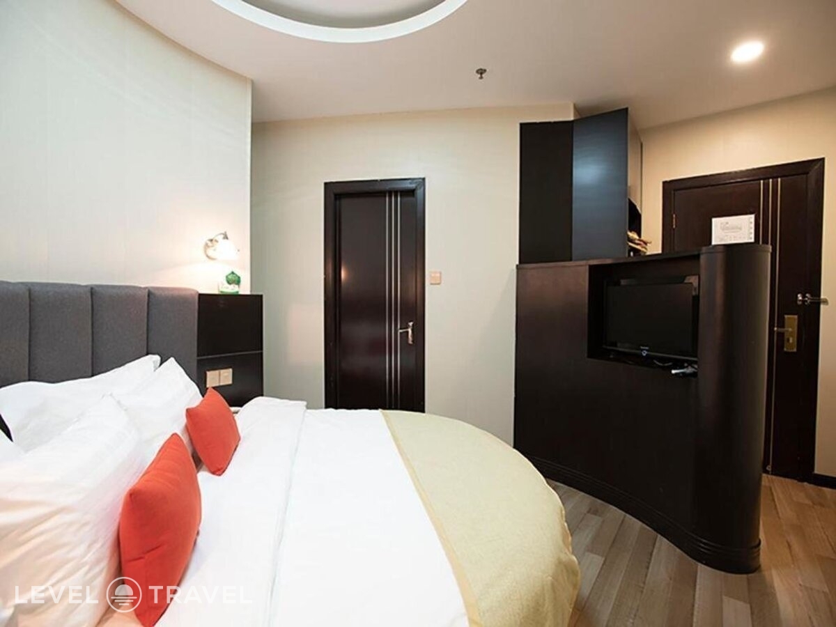 фотографии номера Семейный (две односпальные кровати) отеля Shanghai Joyful Star Hotel в Китай(Шанхай) - фото №6