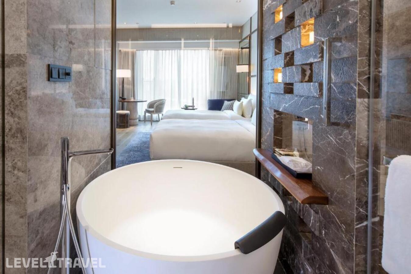 фотографии номера Делюкс (две односпальные кровати) отеля The Anandi Hotel And Spa Shanghai в Китай(Шанхай) - фото №3