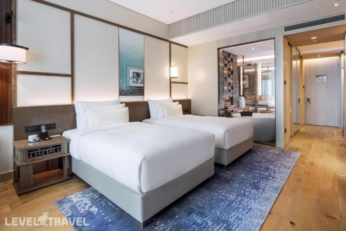 фотографии номера Делюкс (две односпальные кровати) отеля The Anandi Hotel And Spa Shanghai в Китай(Шанхай) - фото №2