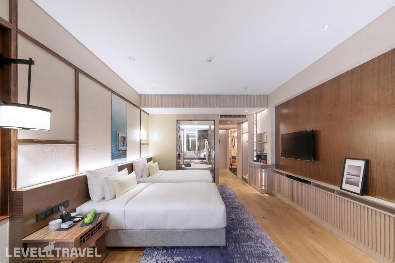 фотографии номера Делюкс (две односпальные кровати) отеля The Anandi Hotel And Spa Shanghai в Китай(Шанхай) - фото №1