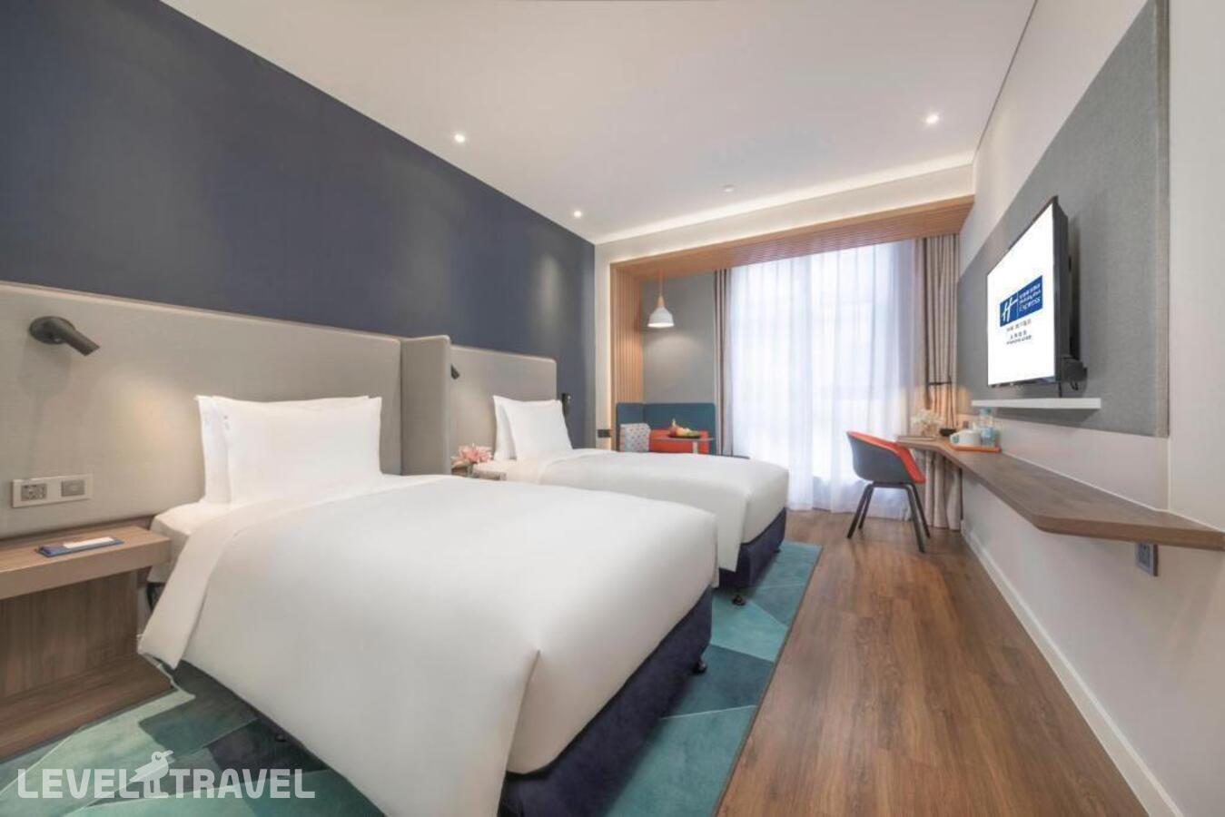 фотографии номера Стандартный (две односпальные кровати) отеля Holiday Inn Express Shanghai Gubei, An Ihg Hotel в Китай(Шанхай) - фото №4