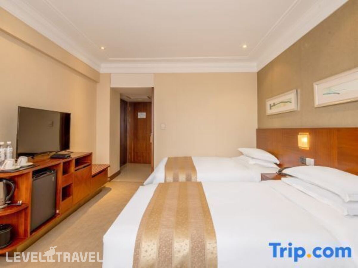 фотографии номера Стандартный (две односпальные кровати) отеля San Want Hotel в Китай(Шанхай) - фото №3