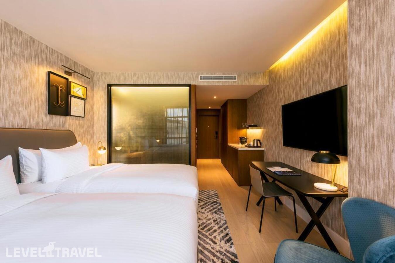 фотографии номера Улучшенный (две односпальные кровати) отеля Radisson Blu Hotel, Casablanca City Center в Марокко(Касабланка) - фото №16