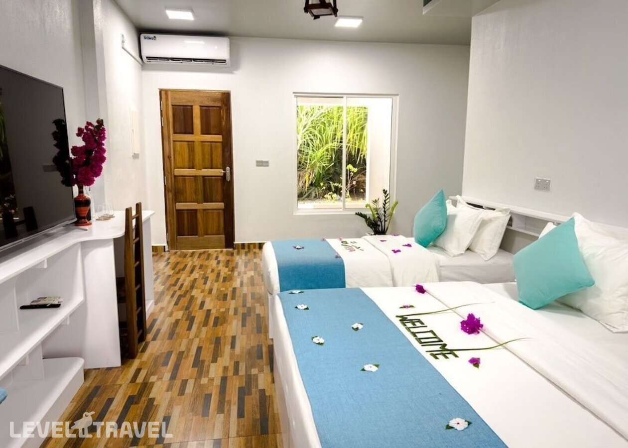 фотографии номера Стандартный номер отеля Island Luxury Dive Hotel Fulhadhoo в Мальдивы(Фулхадху) - фото №5
