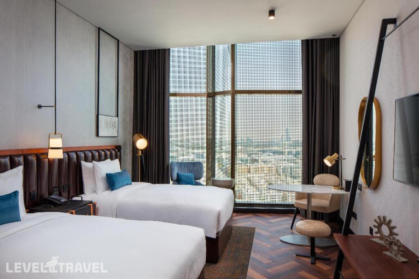 фотографии номера Стандартный (две односпальные кровати) отеля Doubletree By Hilton Dubai M Square Hotel & Residences в ОАЭ(Бар Дубай) - фото №14