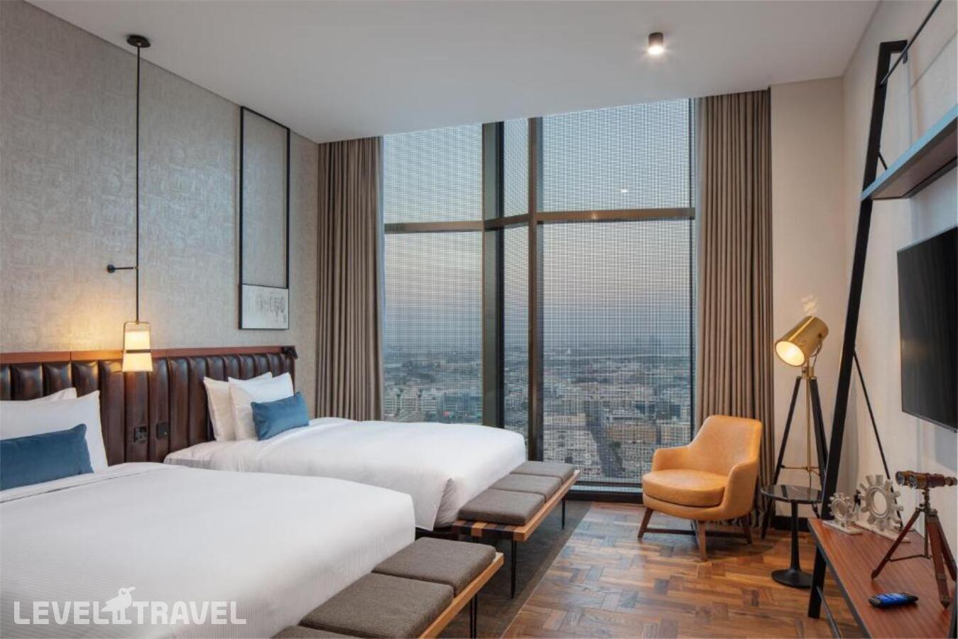 фотографии номера Стандартный (две односпальные кровати) отеля Doubletree By Hilton Dubai M Square Hotel & Residences в ОАЭ(Бар Дубай) - фото №16