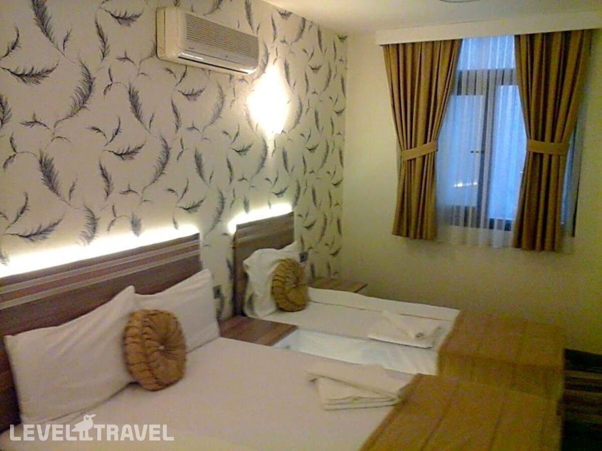 фотографии номера Стандартный с видом на город отеля Olimpiyat Otel Izmir в Турция(Измир) - фото №4