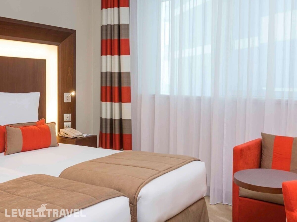 фотографии номера Представительский (две односпальные кровати) отеля Novotel Al Barsha в ОАЭ(Аль Барша) - фото №10