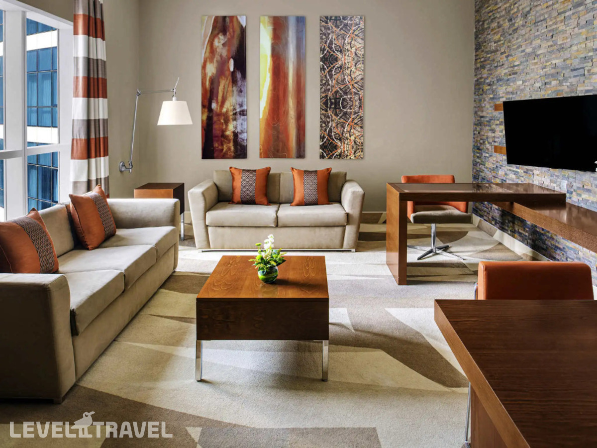 фотографии номера Люкс (2 комнаты) отеля Novotel Al Barsha в ОАЭ(Аль Барша) - фото №3