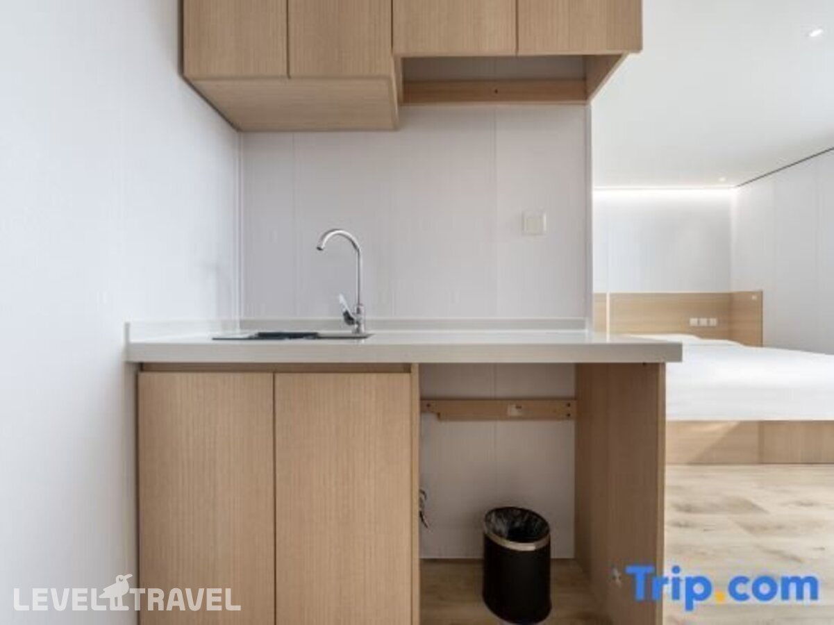 фотографии номера Апартаменты бизнес отеля Dajiaoting International Business Hotel в Китай(Пекин) - фото №4