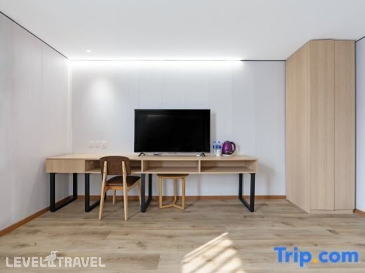 фотографии номера Апартаменты бизнес отеля Dajiaoting International Business Hotel в Китай(Пекин) - фото №3