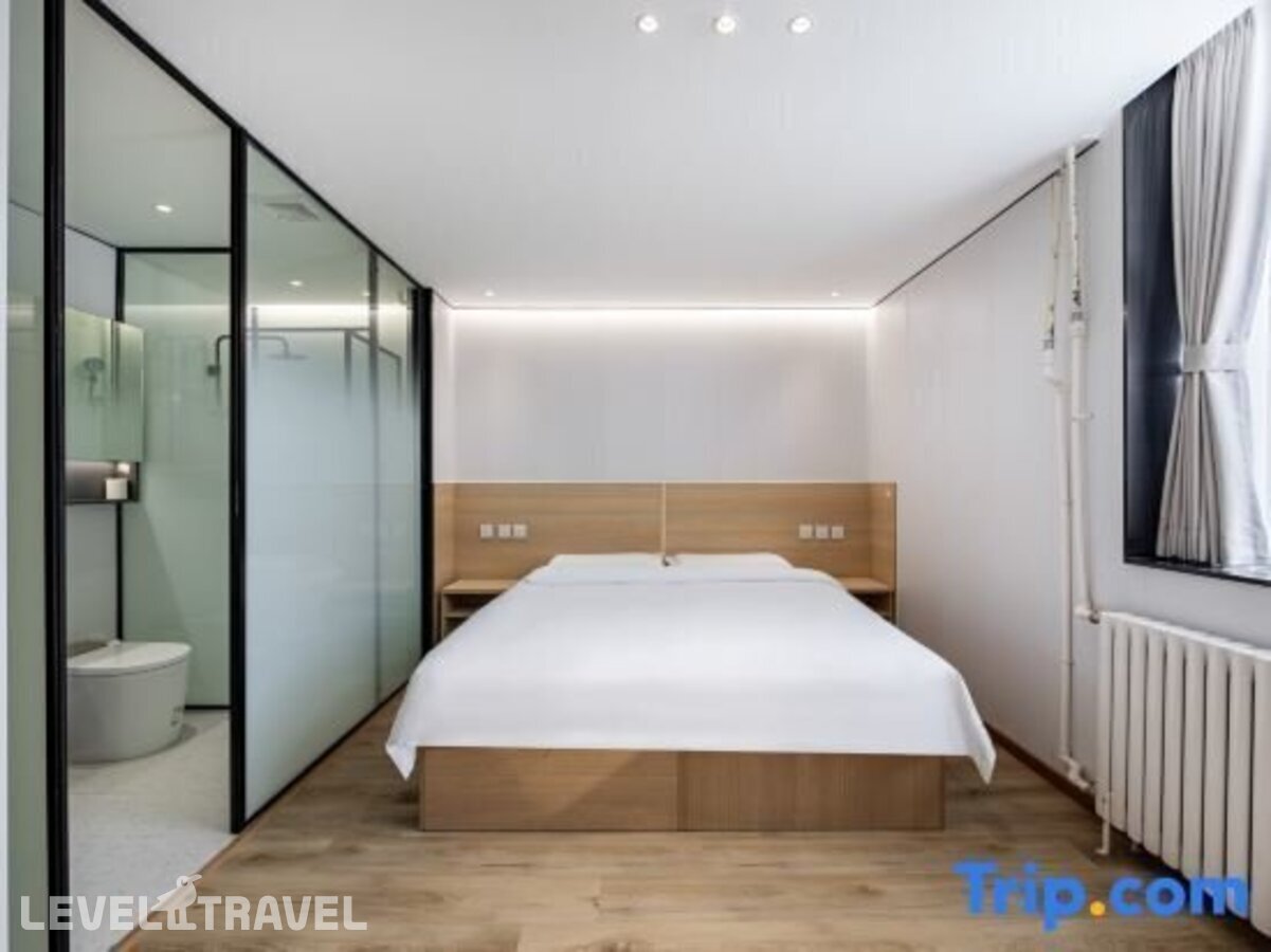 фотографии номера Апартаменты бизнес отеля Dajiaoting International Business Hotel в Китай(Пекин) - фото №1