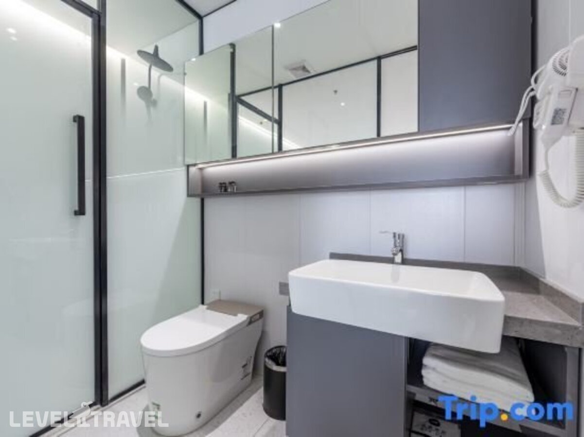фотографии номера Апартаменты бизнес отеля Dajiaoting International Business Hotel в Китай(Пекин) - фото №5