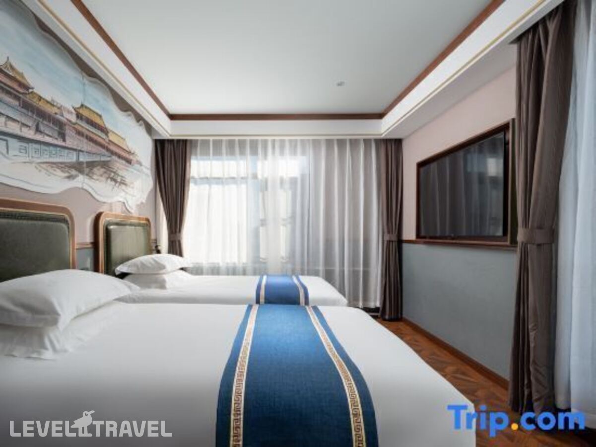 фотографии номера Номер бизнес (две односпальные кровати) отеля Nostalgia S Hotel (Beijing Xi Dan Jinrong Street) в Китай(Пекин) - фото №2