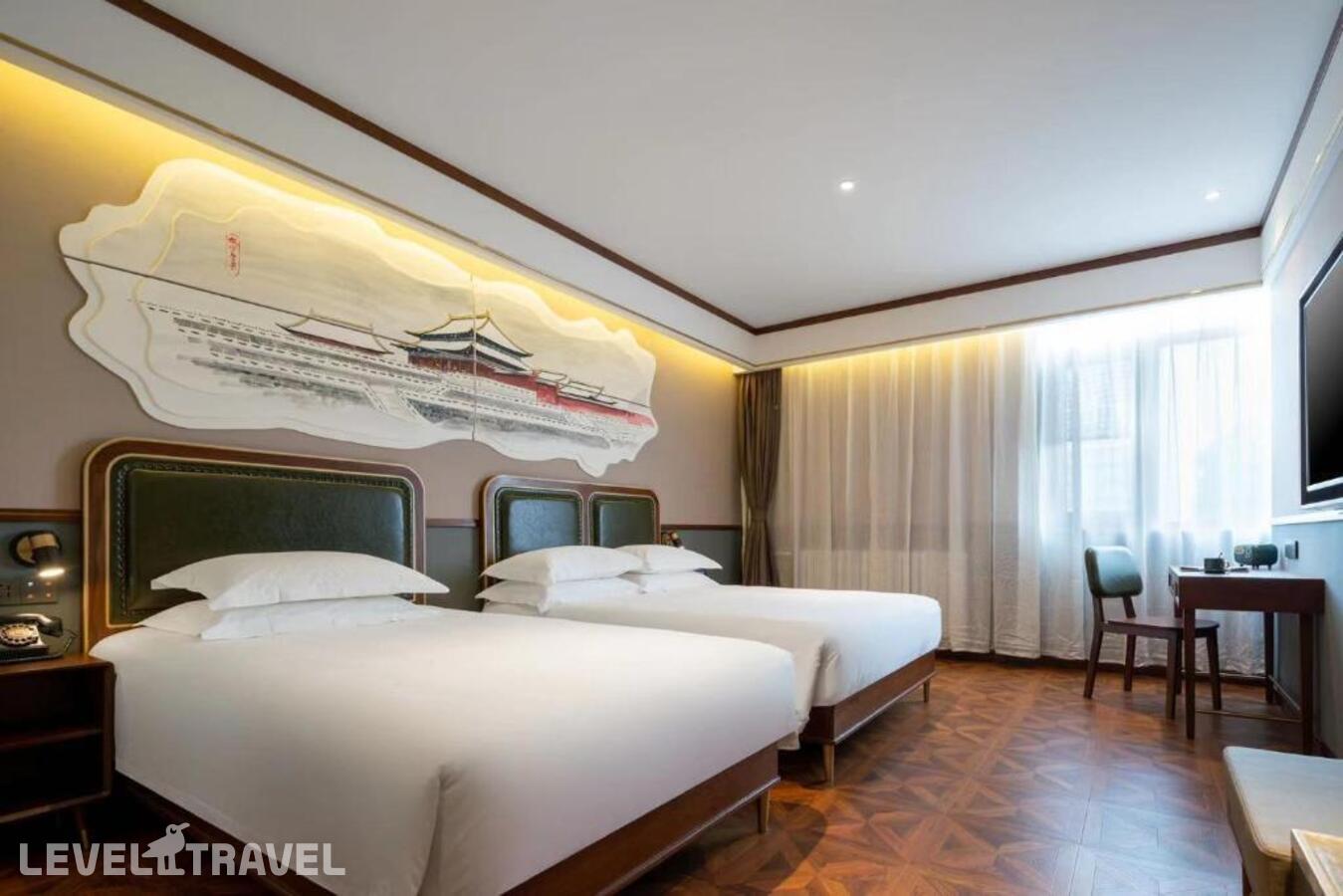 фотографии номера Представительский (две односпальные кровати) отеля Nostalgia S Hotel (Beijing Xi Dan Jinrong Street) в Китай(Пекин) - фото №4