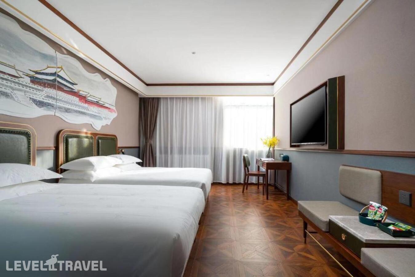 фотографии номера Представительский (две односпальные кровати) отеля Nostalgia S Hotel (Beijing Xi Dan Jinrong Street) в Китай(Пекин) - фото №3