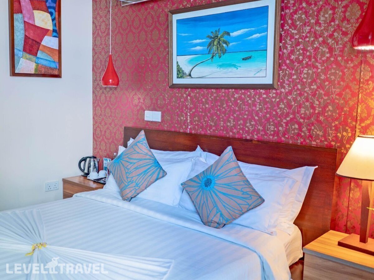 фотографии номера Делюкс отеля Umet Seaview Hotel With Free Roundtrip Airport Pick Up And Drop Off в Мальдивы(Мале) - фото №1