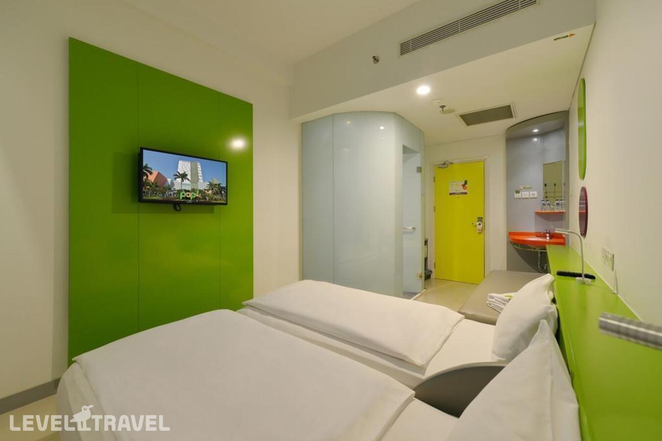фотографии номера Стандартный номер отеля Pop! Hotel Kelapa Gading Jakarta в Индонезия(Джакарта) - фото №5