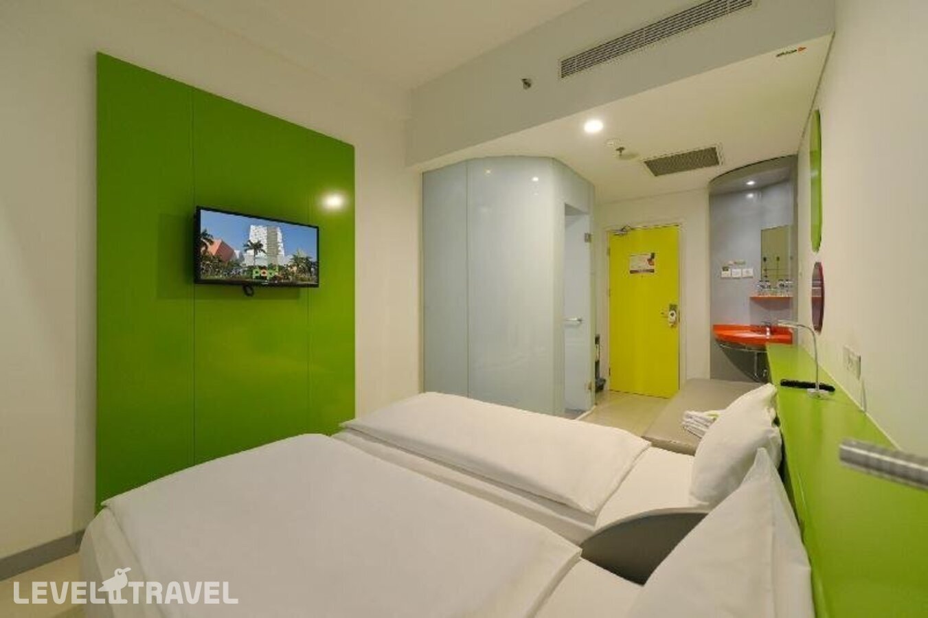 фотографии номера Стандартный (две односпальные кровати) отеля Pop! Hotel Kelapa Gading Jakarta в Индонезия(Джакарта) - фото №3