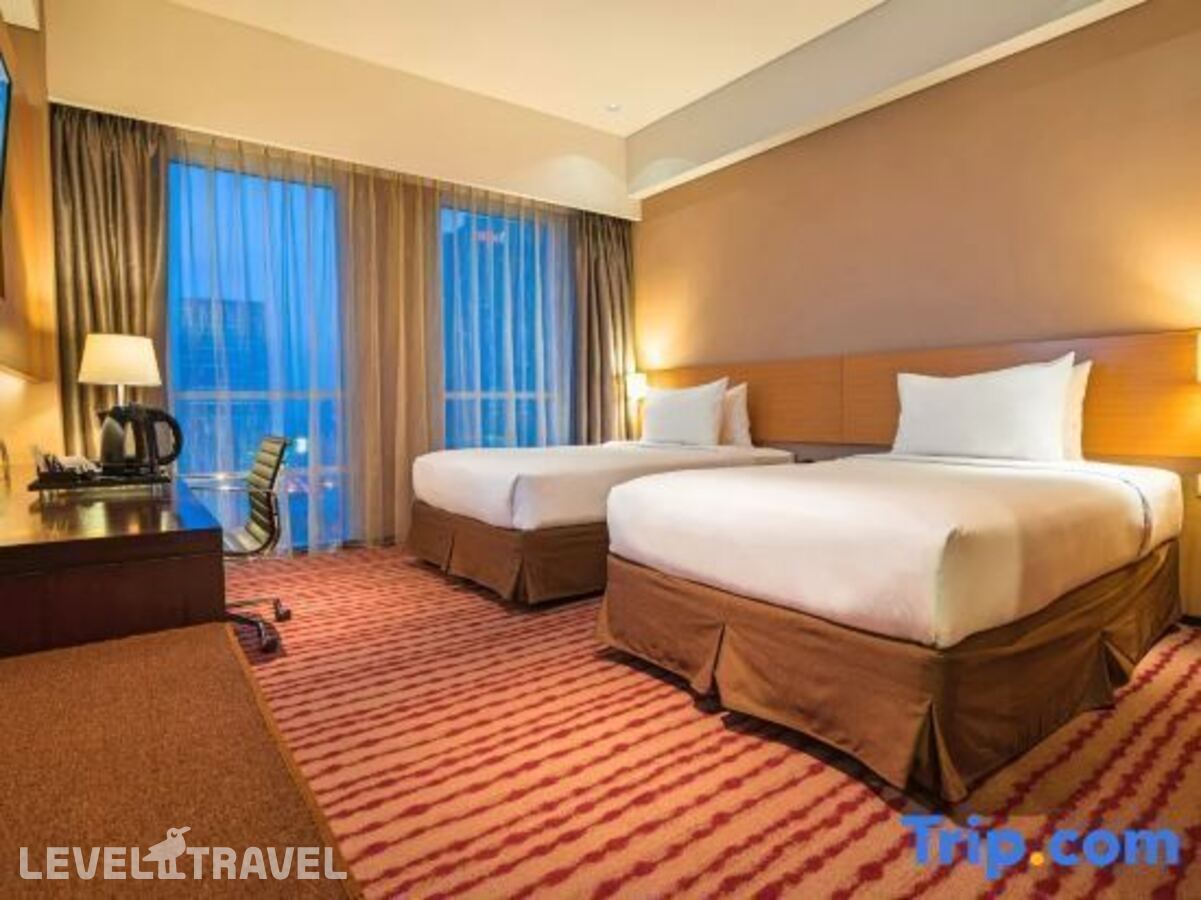 фотографии номера Делюкс (две односпальные кровати) отеля Js Luwansa Hotel And Convention Center в Индонезия(Джакарта) - фото №1