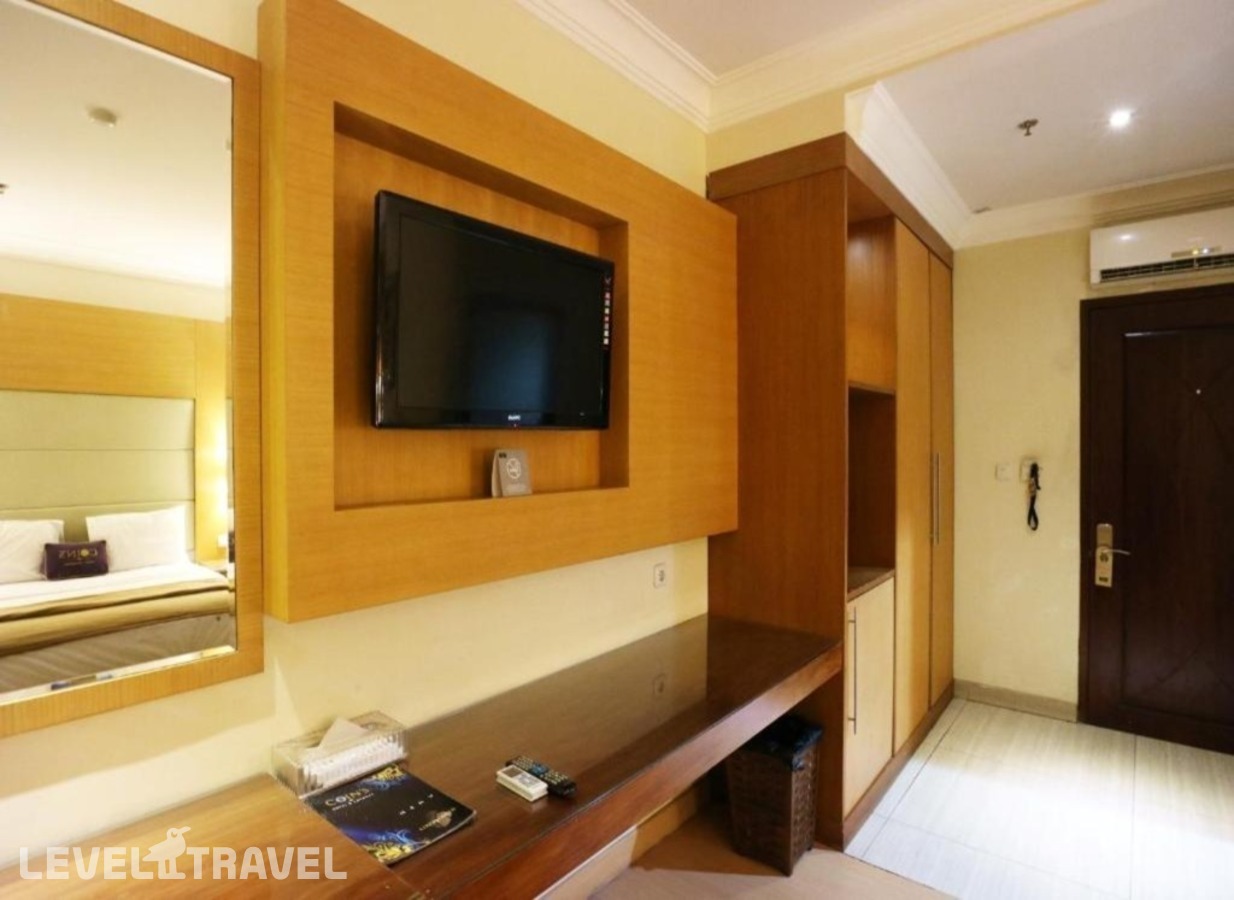 фотографии номера Стандартный номер отеля Coin's Hotel Jakarta в Индонезия(Джакарта) - фото №5