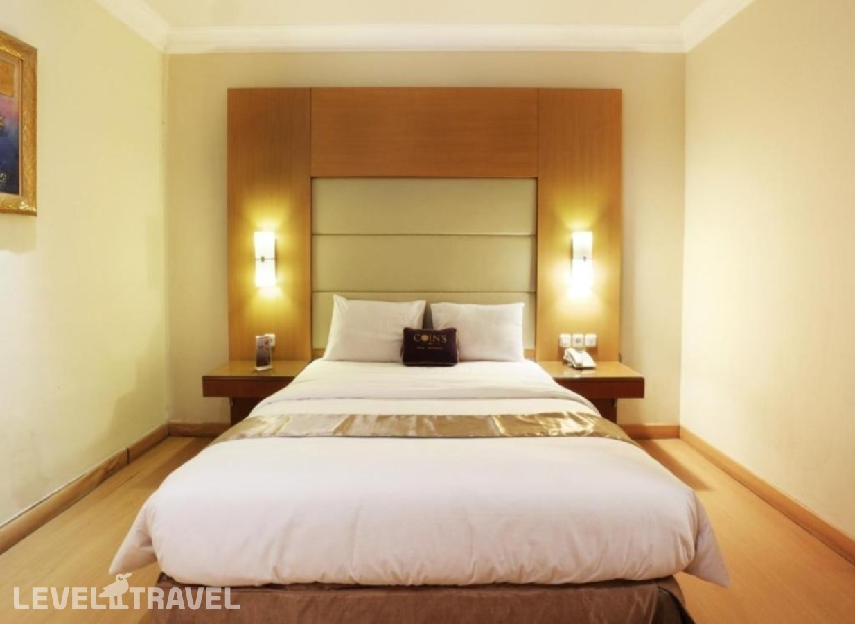 фотографии номера Семейный номер отеля Coin's Hotel Jakarta в Индонезия(Джакарта) - фото №1